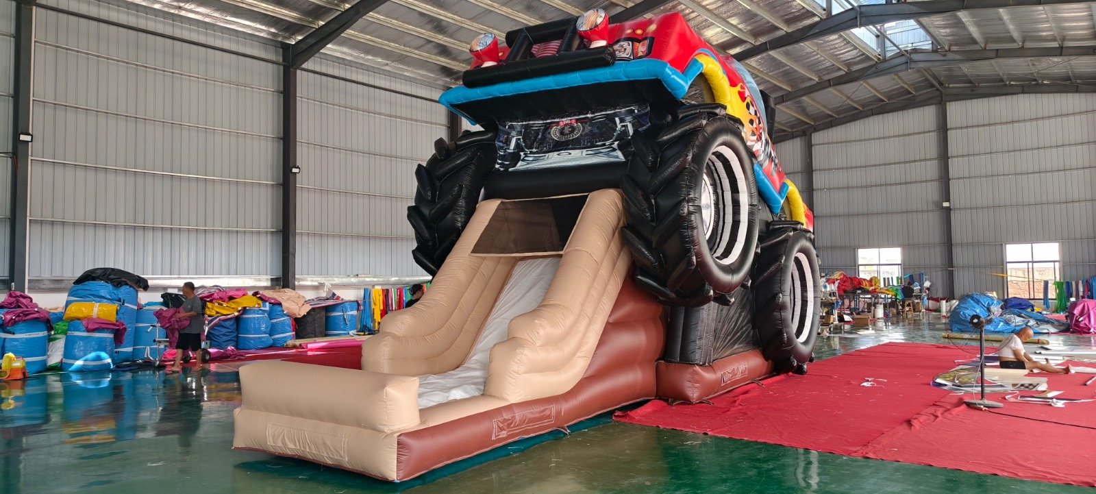 Front view of the monster-truck inflatable slide