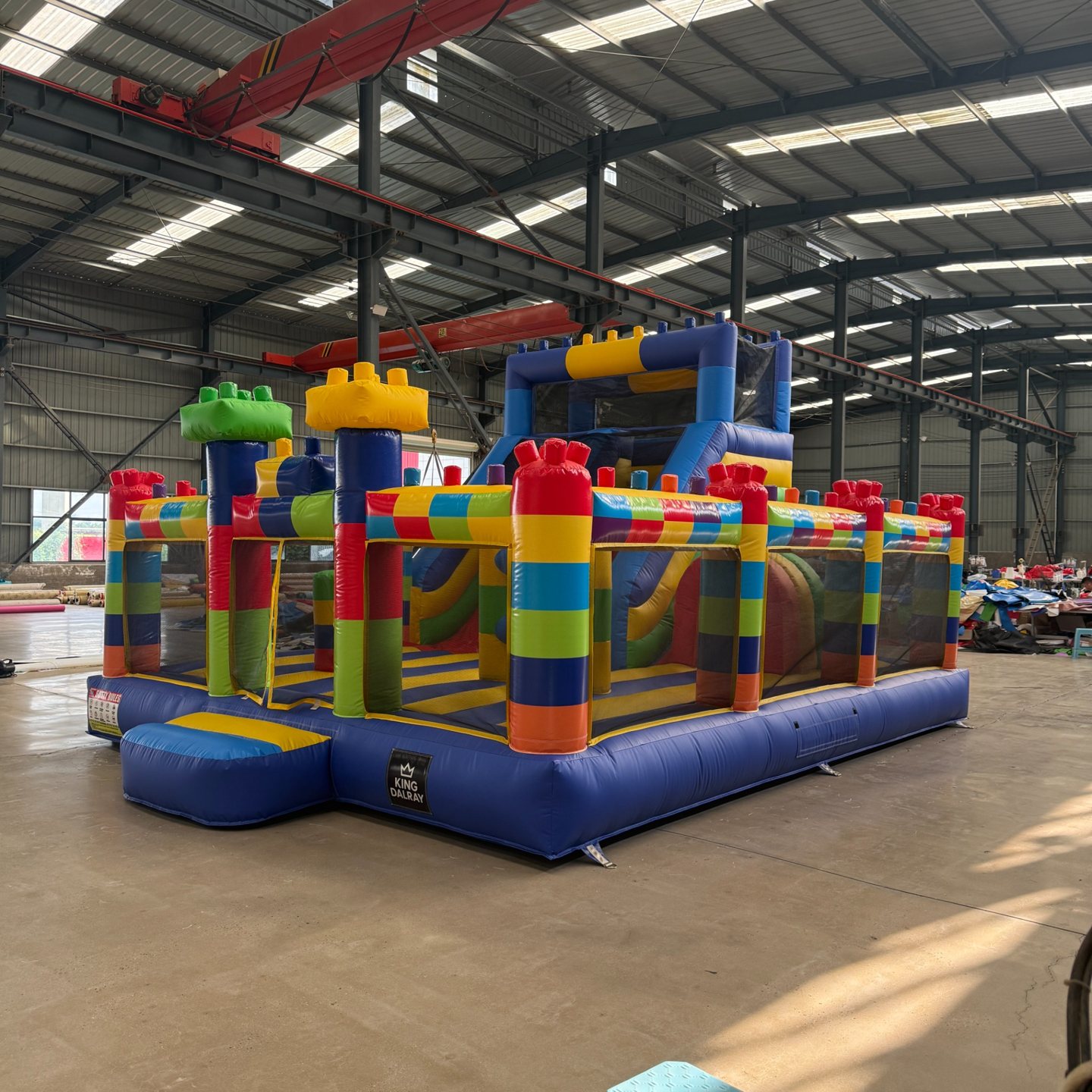 Angled view of the colourful rainbow obstacle castle