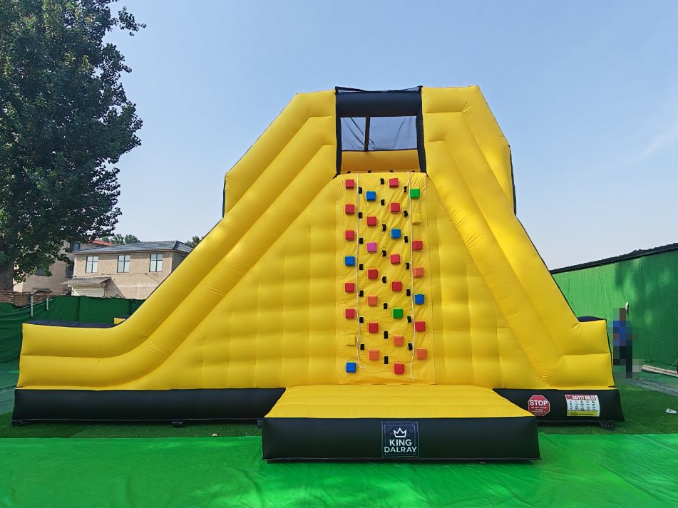 Front view of the yellow inflatable climbing slide